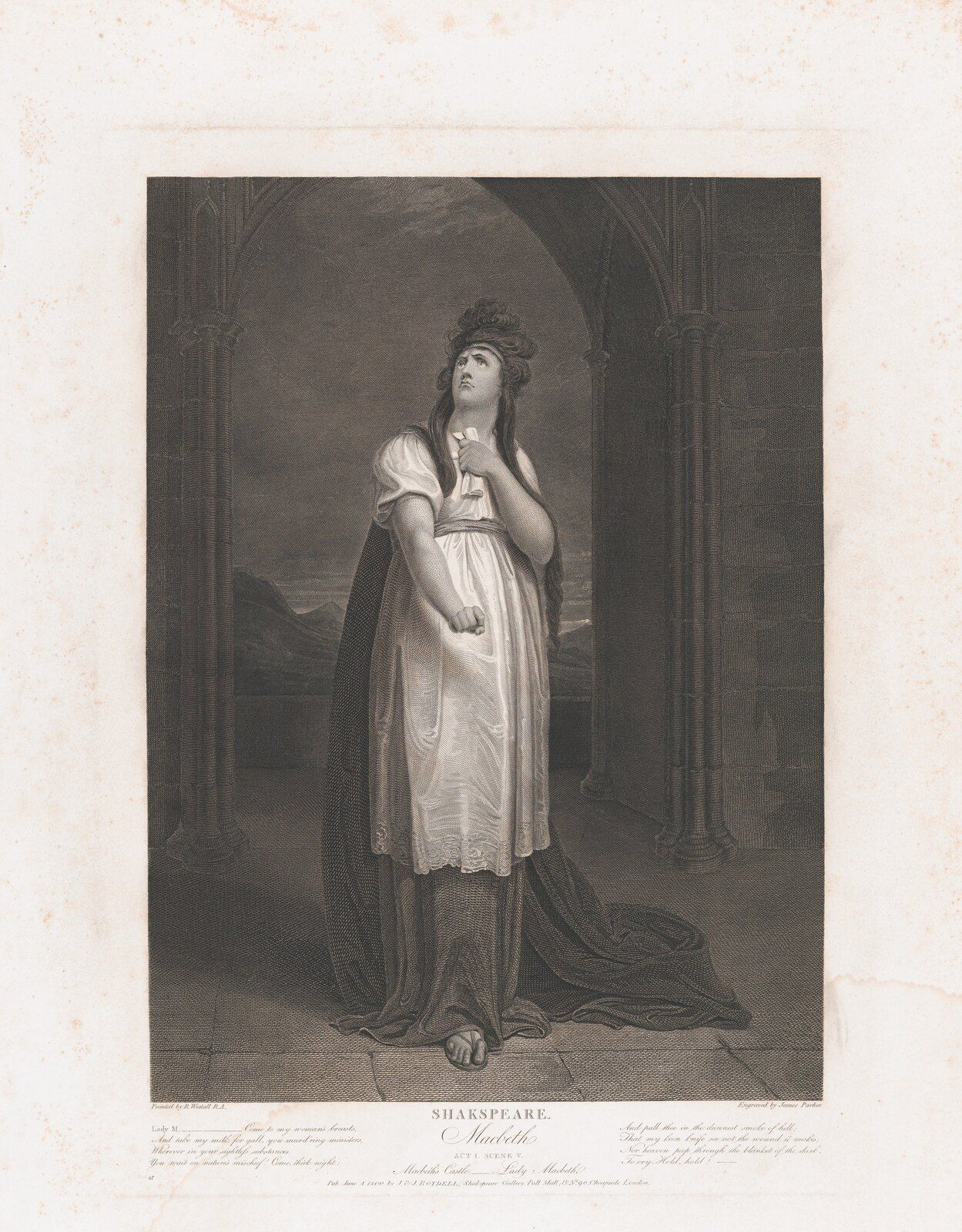 Lady Macbeth stands under an arch with one hand clenched and one hand at her breast